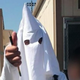 A student tweeted this photo of a classmate who wore a Ku Klux Klan costume for a class project.